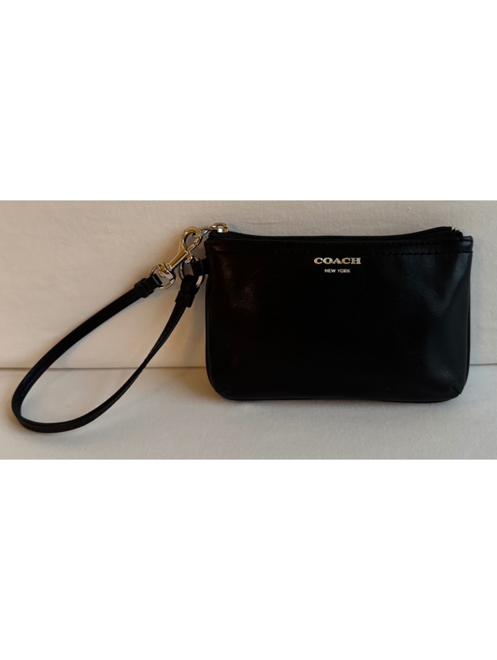 Title: Coach Black Leather Wristlet Zip-Top Pouch with Short Strap